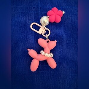 Pink Balloon Dog Keychain all dressed up with Pearl Beads.